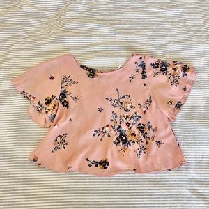 Kimchi Blue cropped light pink floral blouse with open back